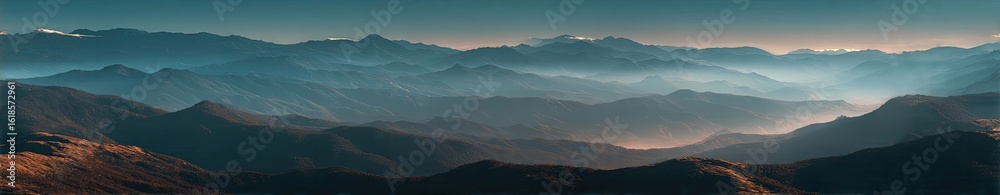 Obraz premium Misty mountain range at dawn (4)