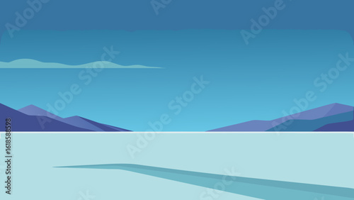 Experience the quiet stillness of a vast empty tundra creating a desolate and peaceful landscape