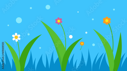 Enchanting grass flowers under a brilliant blue sky shimmering with morning dew