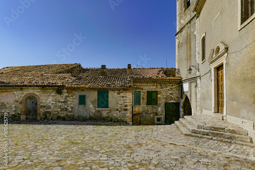 A narrow street among the old houses of Salcito, a small town in the province of Campobasso, Italy.