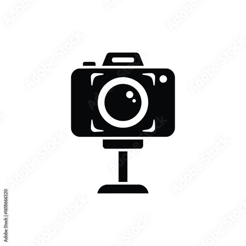 Vector illustration of a black silhouette of a camera on a stand, isolated on a white background, representing photography and visual media