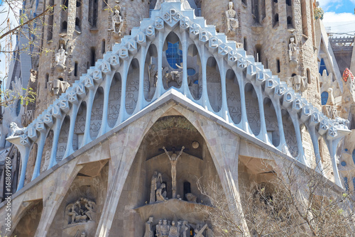 Passion Facade of the Sagrada Familia basilica in Barcelona with detailed sculptures