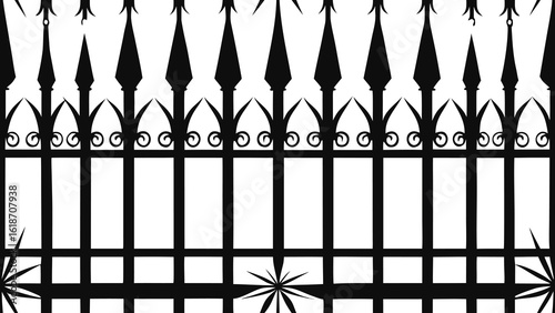 Black wrought iron fence with pointed finials and decorative scrolls white metal