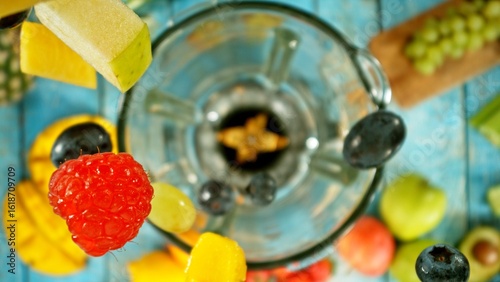 Mixing pieces of fruits in ...
