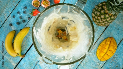 Mixing pieces of fruits in ...