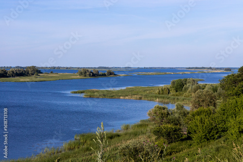 Wallpaper Mural Russian landscape with Volga river on a sunny day. Bolgar, Tatarstan, Russia. View on the valley of Volga river from the hill. Peaceful nature. Beautiful background. Torontodigital.ca
