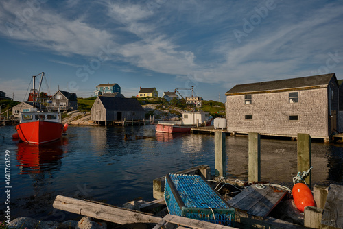 Idyllic and tranquil and calm waters of the protected harbor at Peggy's Cove in Nova Scotia Canada in late afternoon light