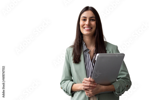 Professional businesswoman confidently smiling, holding tablet, embodying corporate success against clean background