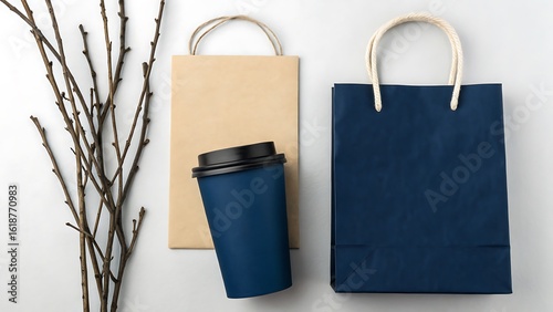 Dark blue coffee cup brown paper bag navy shopping bag twig image