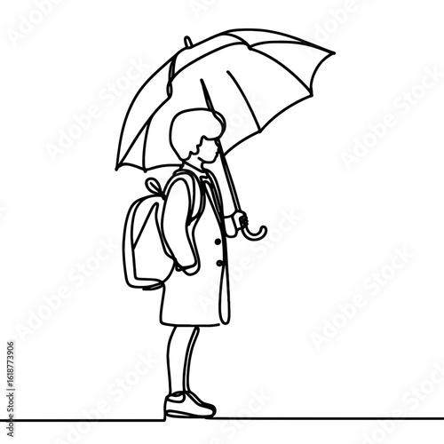 Person standing with umbrella
