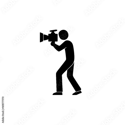 A cameraman recording with his camera.