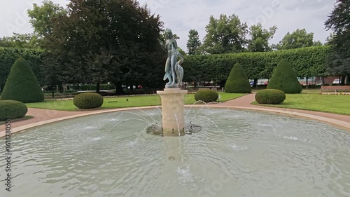 Podebrady, Czech Republic - 2025-07-25.  Lady and the swan statue in the Podebrady town park