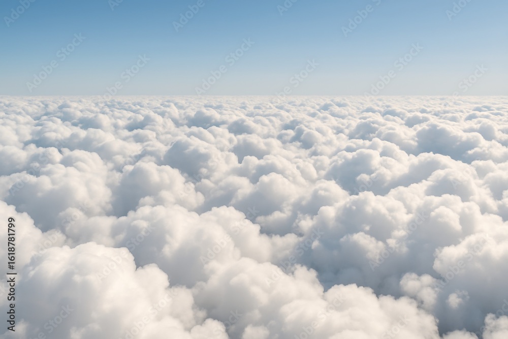 Vast fluffy clouds against clear blue sky Vast fluffy clouds against clear blue sky