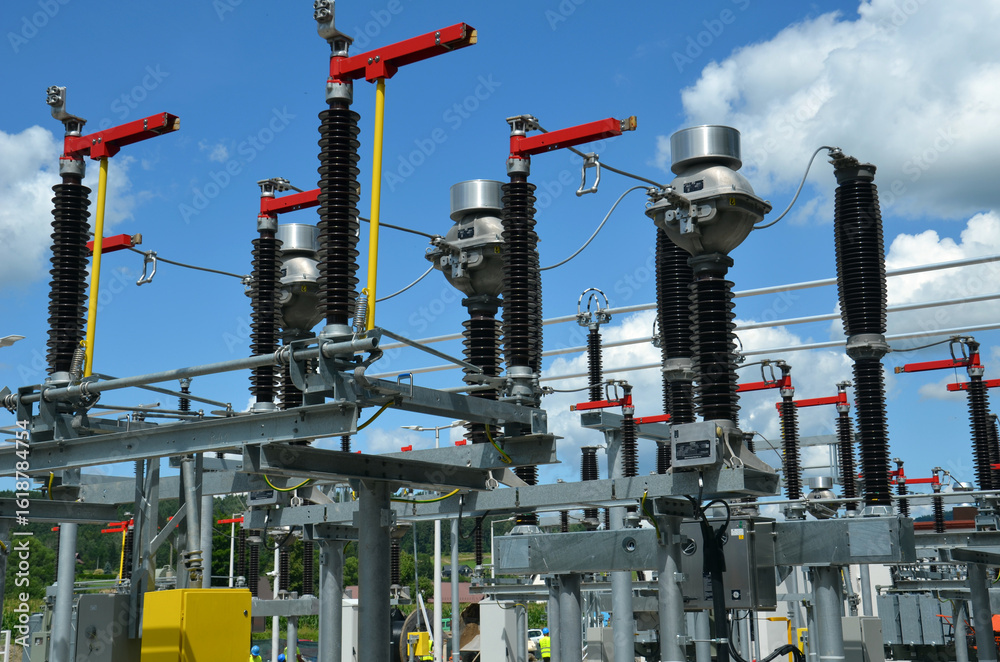 Fototapeta premium Ongoing construction of a 110kV traction substation, part of a railway electrification system.
