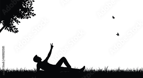 Vector silhouette of a person lying on the grass, making a peace sign, enjoying a tranquil moment in nature.