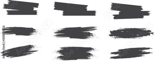 Grunge black paint brush stroke set on white background, rough textured ink smudges for banners, grungy artistic design elements, perfect for digital art, posters, or abstract projects.