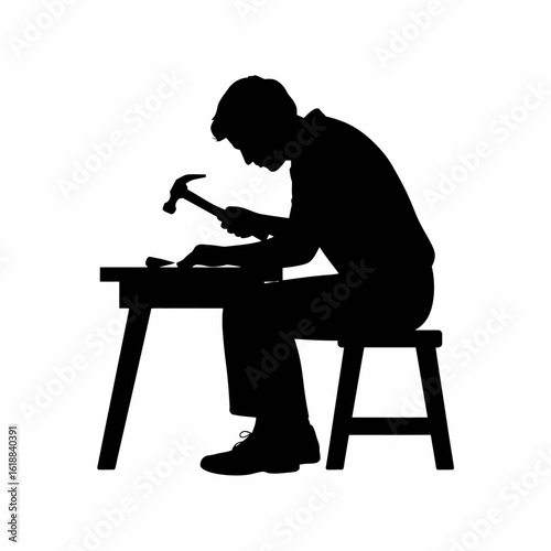Craftsman Silhouette with Hammer at Workbench