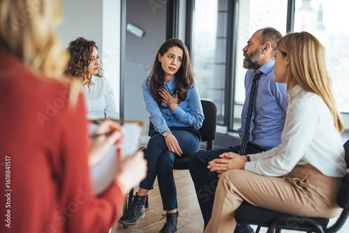 Obraz na plátně Group Therapy Session with Diverse Participants Sharing and Emphasizing Communic