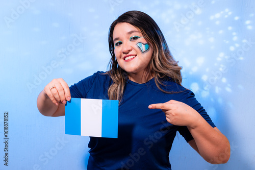 Woman Proudly Showing and Pointing at Guatemalan Flag