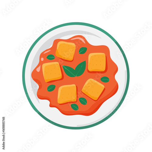 A vibrant plate of paneer in rich sauce, garnished with fresh leaves. The dish is a feast for the eyes