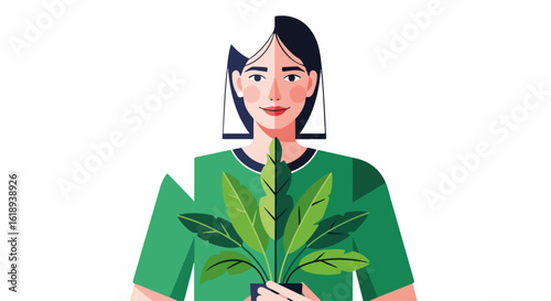 Woman holding plant, indoors, with a contented expression. Woman holding plant and potted leafy greens symbolizing growth and well being,