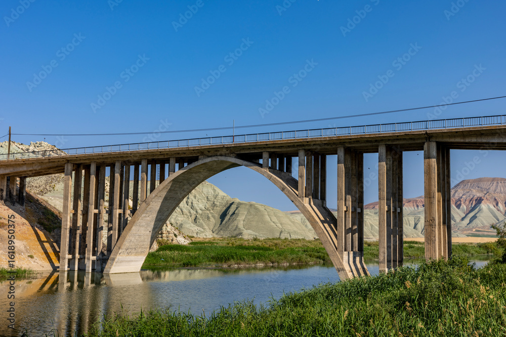 Naklejka premium Nallihan District in Ankara, Turkey. The Girl Hill Natural Monument (Rainbow Hills) the geological structure with its colorful rainbow tones. Nallihan Bird Sanctuary.