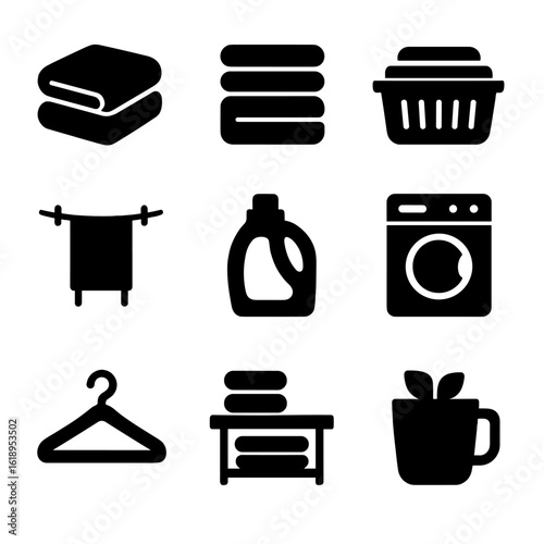 Black Icon Grid. Solid, filled icon set of folding towels and stacking them neatly: folded towel, stack of towels, laundry basket,