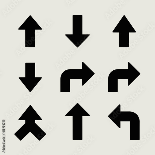 Collection of nine directional arrow silhouettes pointing up down left and right isolated on white background