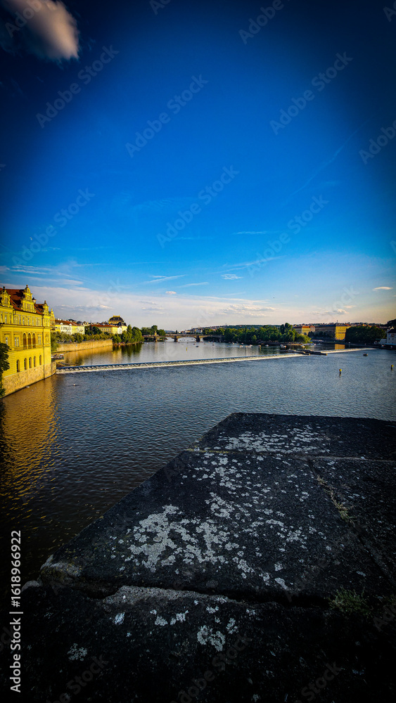 Obraz premium Golden Hour Over Vltava River