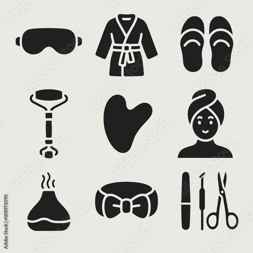 Spa Accessory Icons. Solid style icons of spa accessories and tools: eye mask icon, fluffy robe, spa slippers, jade roller, gua