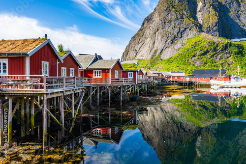 фотографія Red traditional type houses used by fishermen's in Reine village on Moskenesoy i