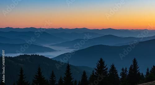 Layered Mountain Ranges at Dusk A Scenic Vista of Nature's Beauty and Tranquility Displaying a Colorful Sky and Evergreen Trees