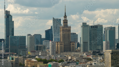 A drone shot from the east side near the National Stadium in Warsaw frames the city’s modern skyline, soaring skyscrapers, the Palace of Culture and Science, and vivid rooftops—all rising above Praga 