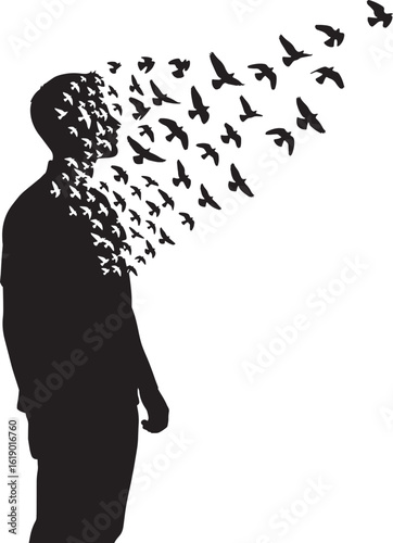 Silhouette of man dissolving into flock of birds flying