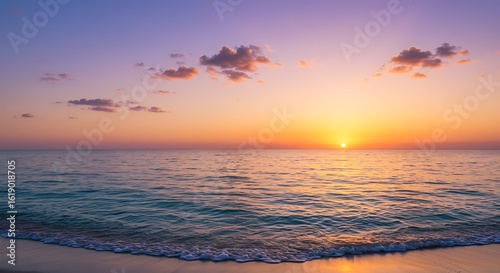 Sunset Over Ocean with Calm Waves and Vibrant Sky Colors