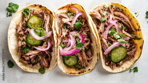 Savory Pulled Pork Tacos with Fresh Ingredients and Toppings