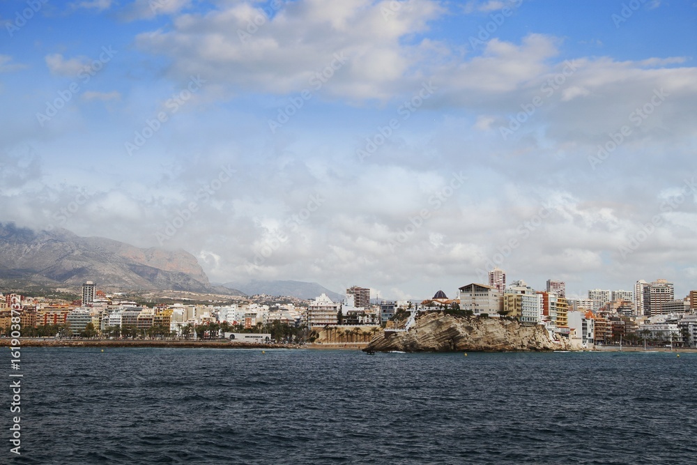 Obraz premium Aerial view from de Mediterranean Sea of the antique center of Benidorm city and the Levante Beach with the skyline.