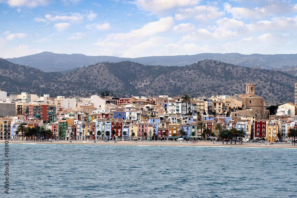 Naklejka premium Aerial view of the colored houses in Villajoyosa town beach in the Mediterranean Sea, Alicante, Spain.