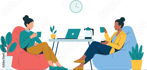 Two women relaxing in comfortable beanbag chairs enjoying coffee and conversation