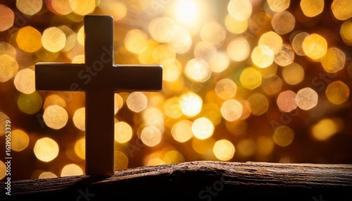 beautiful gold bokeh background with a christian cross