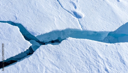 Detailed Close Up of Cracked Blue Ice Texture in a Frozen Arctic Landscape