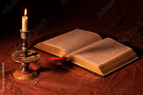 Bible and candle