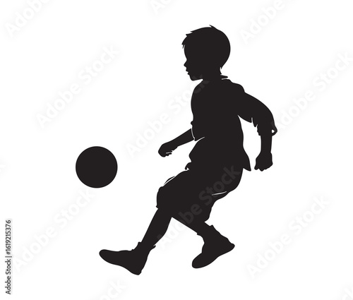 Black silhouette of a child kicking a ball.
