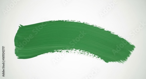 Green Brush Stroke on White Background Artistic Textured Paint Mark