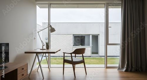 Modern Interior with Desk and Chair by Large Window