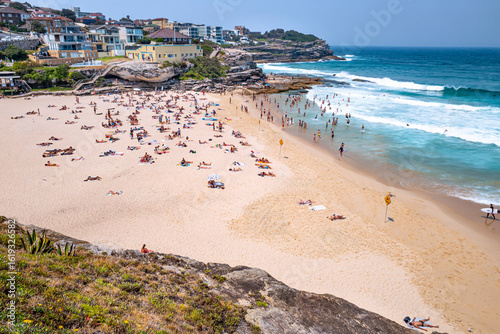 Fototapeta Naklejka Na Ścianę i Meble -  Tamarama beach. It is surrounded by high cliffs, with a deep tongue of sand with just 80m of shoreline and beautiful clear waters. Sydney, Dec 2019