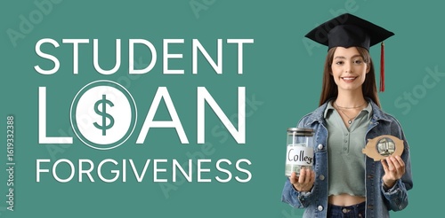 Young girl in graduation hat holding piggy bank and jar with money on green b...