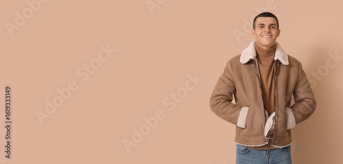 Young man in sheepskin jack...