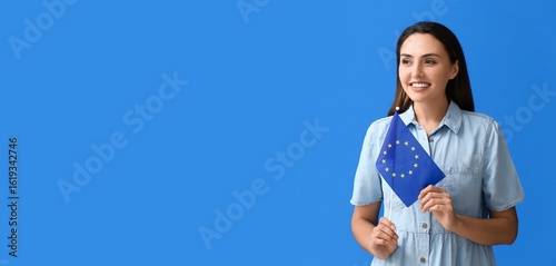 Young woman with flag of Eu...