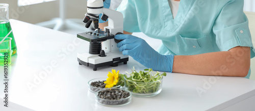 Female scientist with micro...